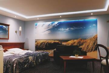Фото номера Улучшенный двухместный номер с 1 кроватью Мини-отель Restauracja Hotel Paradise г. Чаплинек 5